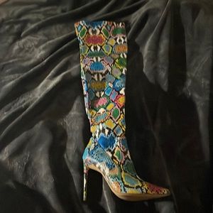 Steve Madden multicolor snake skin knee high boots.